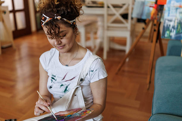 istock Female artist preparing to paint 2213588462