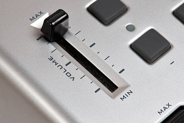 Midi keyboard controller close up with faders wheel buttons and knobs pitch, band, modulation, octave max min