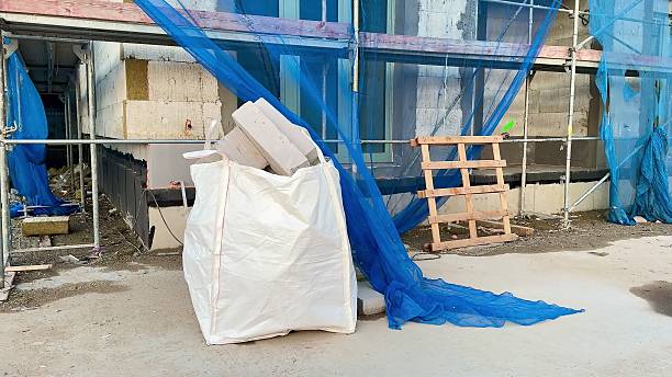 istock Construction Site Featuring Various Materials, Equipment, and Essential Safety Gear 2213592185