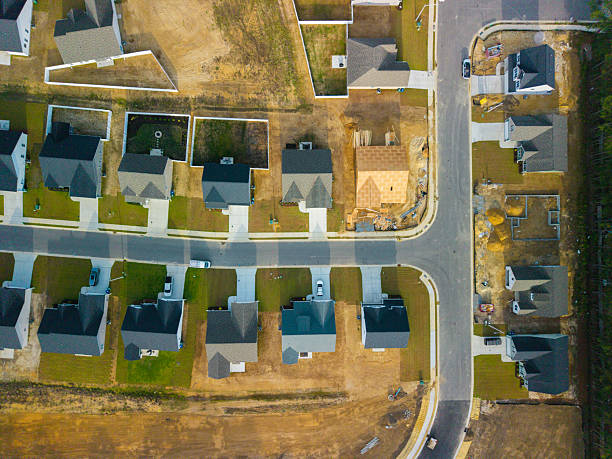 istock New Development Neighborhood - Houses Under Construction - Top Down 2213592187