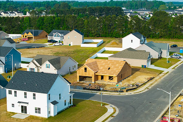 istock New Development Neighborhood - House Under Construction - Close Up 2213592721