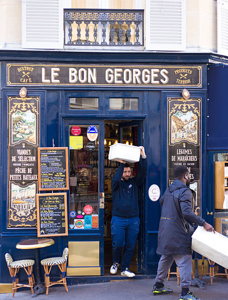 Paris, France: Delivery men at Le Bon Georges, an old-fashioned, upscale bistro/restaurant in the 9th arrondissement.