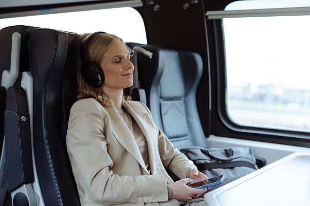 istock Businesswoman enjoying train ride 2213607967