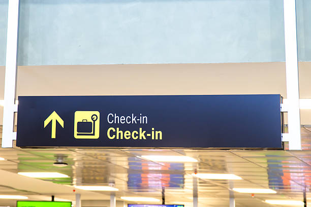 istock Sign at the airport indicating check in 2213613682