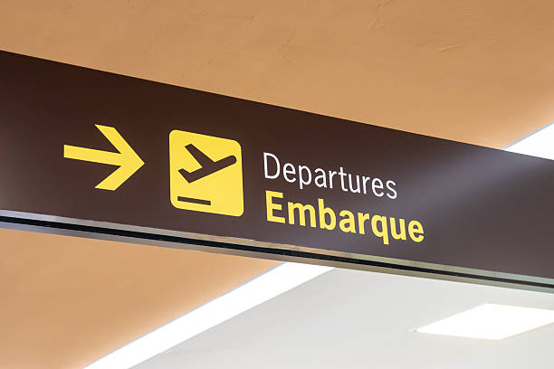 istock Airport sign indicating boarding. 2213613713