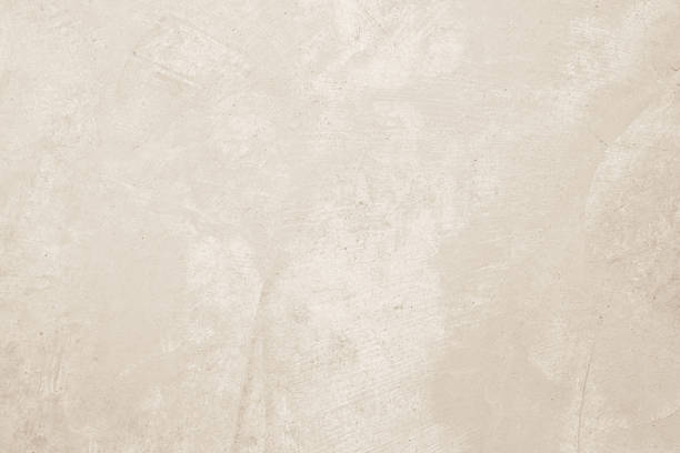 istock Colour old concrete wall texture background. Close up retro plain cream color cement wall background texture. Design paper vintage parchment element. 2213615260