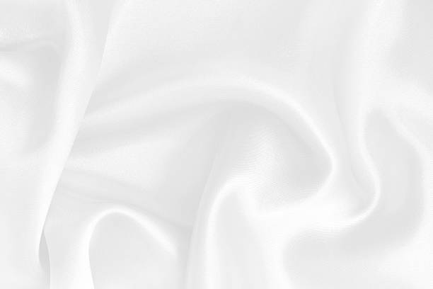istock White fabric cloth texture for background and design art work, beautiful crumpled pattern of silk or linen. 2213621975