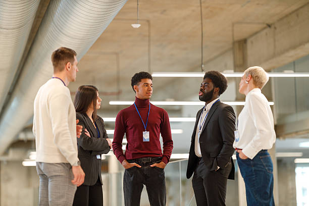 istock Business Professionals Networking at a Seminar 2213624978