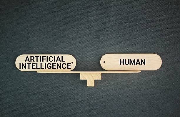 istock the balance between the words human vs. artificial intelligence. The balance between humans and AI. Create art generate content impact. 2213628149