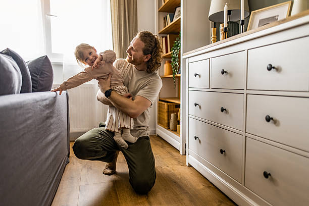 istock Father and daughter spending time together at home 2213632188