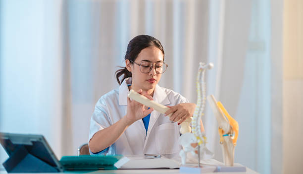 istock Asian Medical Student Studying Anatomical Model 2213635783