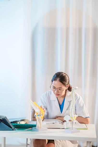 istock Asian Medical Student Studying Anatomical Model 2213635918