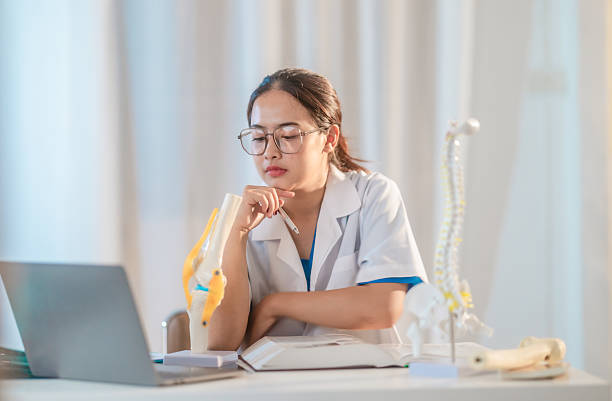 istock Asian Medical Student Studying Anatomical Model 2213635987