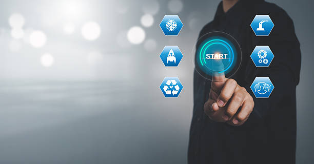 istock Starting a Business Businessman Pressing the Start Button 2213636103