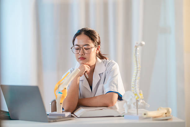 istock Asian Medical Student Studying Anatomical Model 2213636241