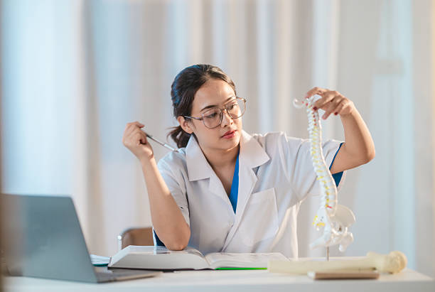 istock Asian Medical Student Studying Anatomical Model 2213636985