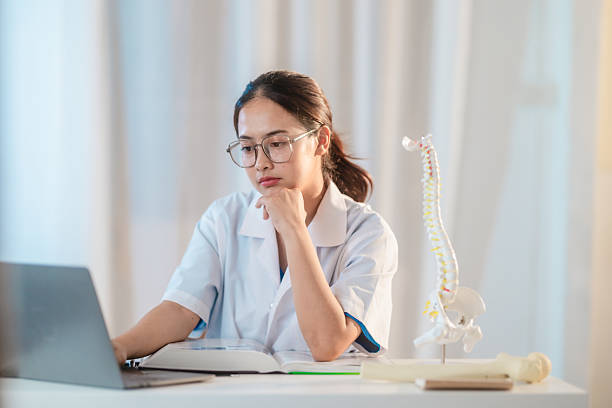 istock Asian Medical Student Studying Anatomical Model 2213637016