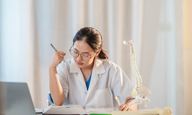 istock Asian Medical Student Studying Anatomical Model 2213637122