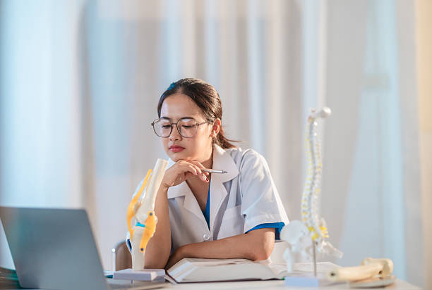 istock Asian Medical Student Studying Anatomical Model 2213637410