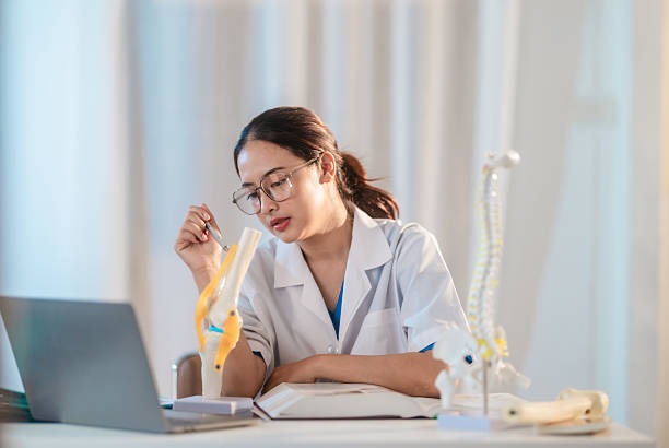 istock Asian Medical Student Studying Anatomical Model 2213637415