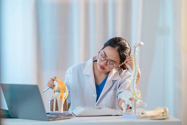 istock Asian Medical Student Studying Anatomical Model 2213637510