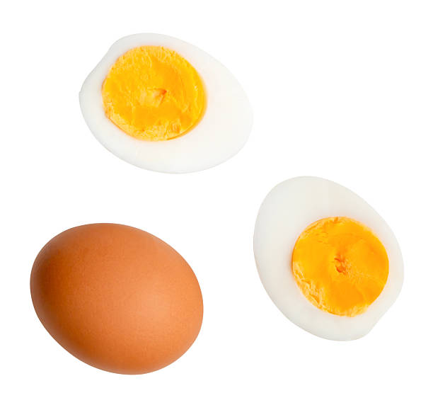 istock Top view set of raw chicken egg and cooked or boiled egg with egg yolk in two halves isolated on white background with clipping path 2213647404