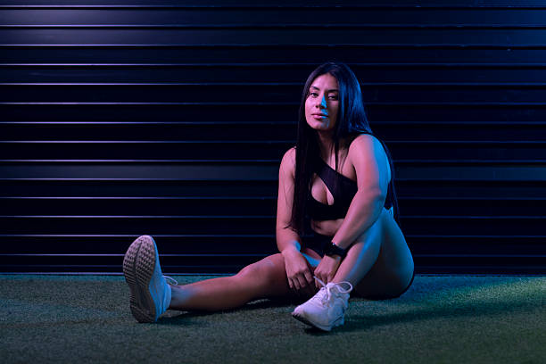 istock Confident mexican fitness trainer posing after workout session 2213648701