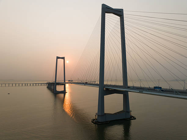 istock Cross-sea bridge, sunrise 2213649050
