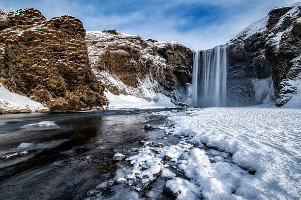 istock Famous Skogafoss waterfaal on Iceland during winter 2213650778