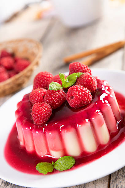 istock Delicious panna cotta dessert with raspberries sauce 2213652001