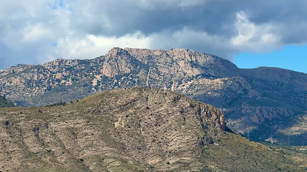 istock A breathtaking and stunning mountain landscape showcases dramatic clouds above it 2213656554