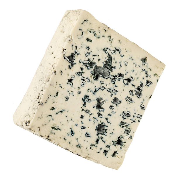 istock Blue Cheese piece isolated on white. Blue cheese block with mold Top view. Flat lay.  Package design element. 2213658457