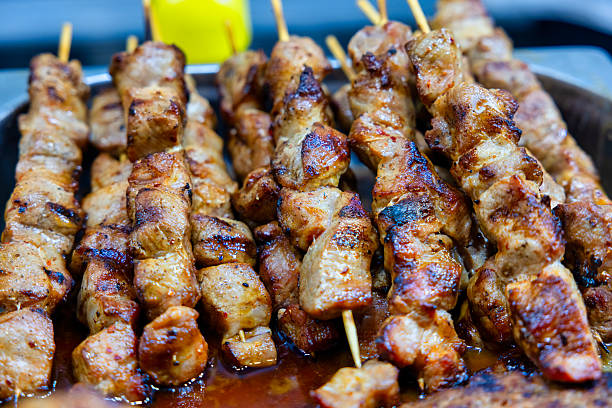 istock Stacked skewers that have been grilled on charcoal grills 2213658626