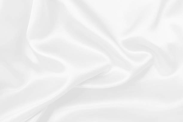 istock White fabric texture background, detail of silk or linen pattern. 2213662367