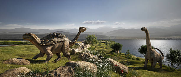 istock Dinosaurs roaming prehistoric landscape 2213663630