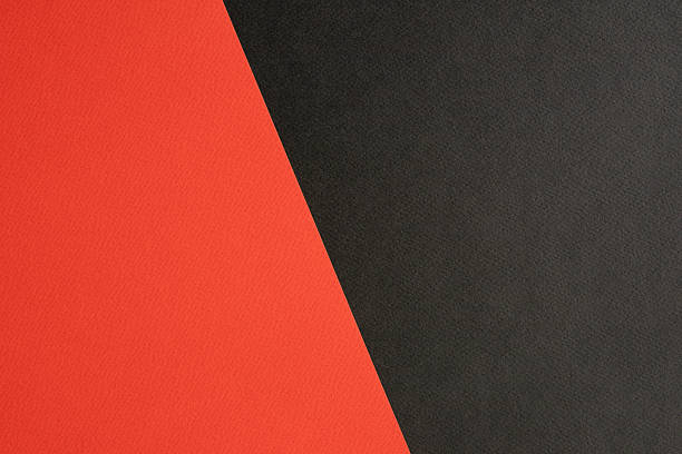 istock Black and red colored paper background texture, Two tones, Concept for image, text, design. Geometric paper backdrop. 2213664603