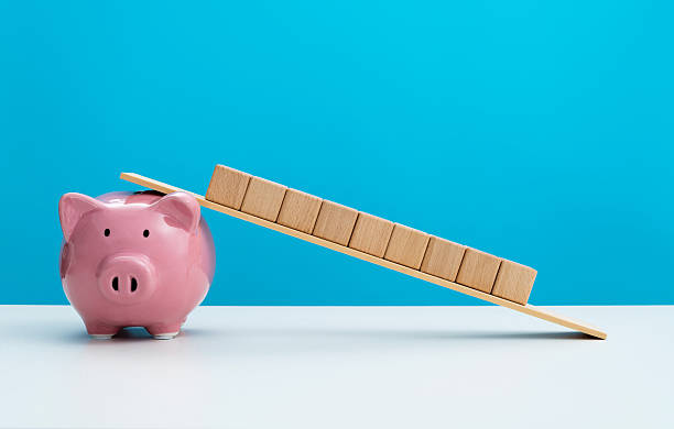 istock Piggy bank with blank blocks 2213673506