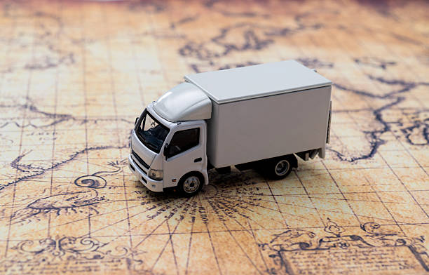 Toy truck on world map.