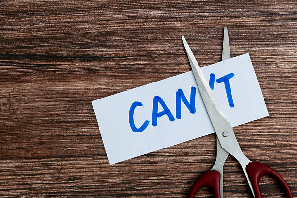 istock Scissor cutting word can't to can 2213673958