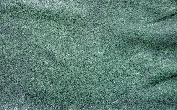 istock Real leather texture showcasing a unique green hue with a smooth finish 2213674090