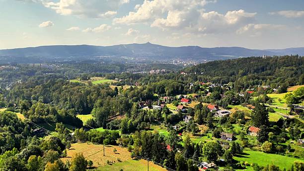 istock This is a scenic overview showcasing a lush green valley set beneath a bright, expansive sky 2213674248