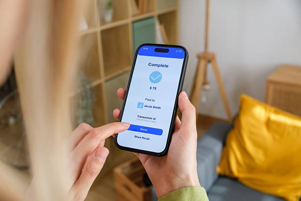 istock Person Using Smartphone for Online Payment 2213678700