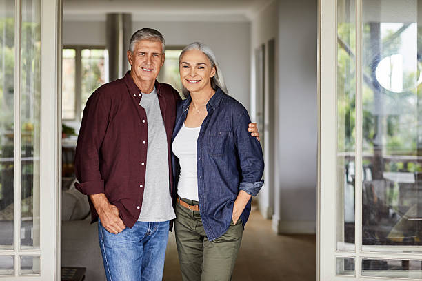 istock Smiling mature couple at home 2213679884