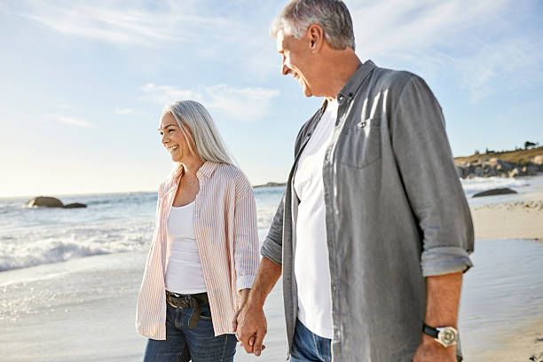 istock Romantic smiling couple at beach during vacation 2213680131