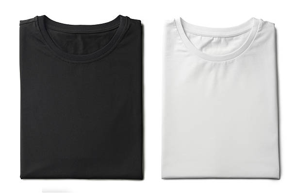 istock White and black folded t-shirts isolated on white, top view. Mockup for design 2213681092