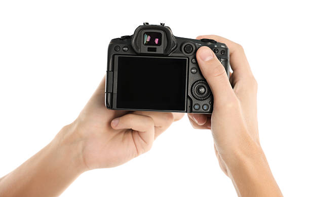 istock Photographer with professional camera on white background, closeup 2213681289