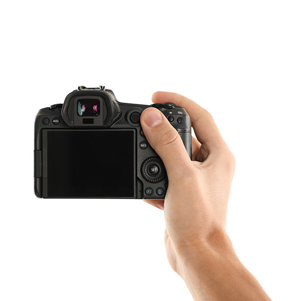 istock Photographer with professional camera on white background, closeup 2213681290