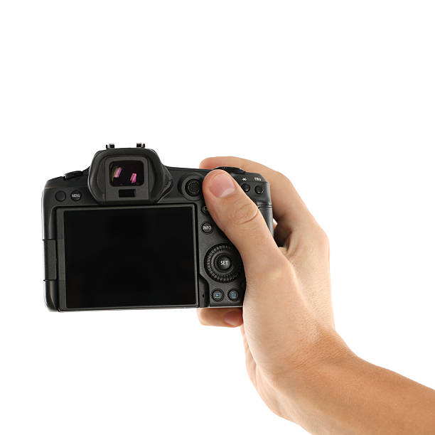 istock Photographer with professional camera on white background, closeup 2213681296