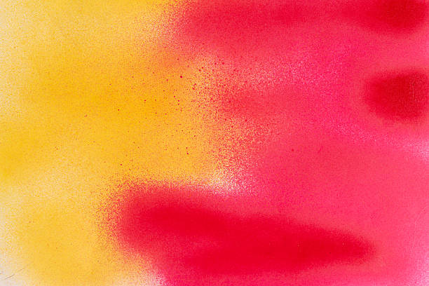 istock Red and yellow spray paint background 2213682156