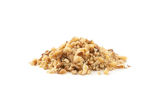 istock Grated wallnut , broken roasted walnuts, heap of nuts crumbs, whole kernel pieces, fractions 2213692101
